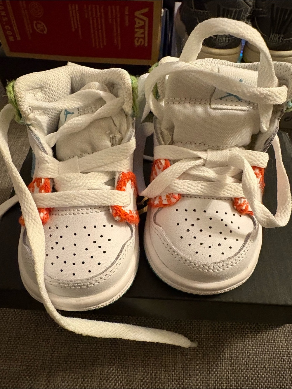Nike White Kids Sneakers with Orange Accents